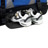 Athletic shoes in a Blue & grey 36" Adventure 2-Section Drop Bottom Rolling Duffel Bag. In-line blade wheels, telescopic handle & Shoe pocket.