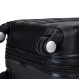 Bottom view of black 20" Chicago Hardside Expandable Spinner Carry-On luggage w/ double spinner wheels, top corner guards & telescopic push-button trolley handle, fully-lined interior w/ elastic tie straps & zippered garment divider.