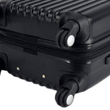 Bottom of black 2 pc Chicago Expandable Spinner Luggage Set w/  (8) double-spinner wheel system, accessory pockets, corner bumper guards & Telescopic push-button trolley handle.
