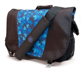 A black and blue 16"-17" Sumo Messenger Bag w/ pockets, adjustable computer compartment for up to 16" PC or 17” MacBook Pro. Corduroy-lined adjustable computer compartment fits up to 17” laptops Interior pockets, Front & rear exterior hidden zipper pockets, 2 under flap pockets.
