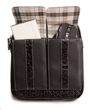 An open black women's 10" Crossbody Tech organizer Messenger bag w/ faux crocodile accents. Has padded fur-lined pocket to store an iPad or 11" tablet. Made of vegan leather exterior w/ contrast stitching & plaid cotton-twill lining.