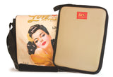 This is a peach 14.1" Maddie Powers Pulp Fiction Laptop Bag w/ pulp magazine images doubles as a tote bag w/ removable laptop sleeve, soft velveteen trim & old Hollywood style. Shows separate laptop sleeve.