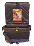 An open 15.4" Maddie Powers Retro Football Messenger Bag. The Messenger bag’s exterior icon football image is that of a sports pulp magazine from the 40's and 50's while the actual vintage magazine cover is printed on the inside lining. On the exterior is a sports icon enamel badge.