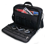 An open ballistic nylon 15.6" Select laptop Briefcase. Built-in elastic shoulder strap system, padded laptop pocket & multiple zippered compartments.