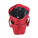 An open large red ballistic nylon Sumo Large Tote / diaper bag w/ white stitching, faux-leather detail, Interior & Exterior pockets all around, Magnetic Closures & Printed liner
