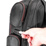A side view of ballistic nylon black 16" Gaming Checkpoint Friendly Backpack w/ red trim & velcro front panel, padded air-mesh shoulder straps & back panel, padded carry handle & trolley strap for stacking on other luggage. Shows embedded USB port & exterior pockets.