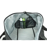 A charcoal cotton canvas duffel w/ black leather trim, inner lining & shoe compartment
