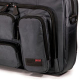 A 16" Graphite Corporate Briefcase w/ three exterior padded pockets, padded handles & shoulder strap.