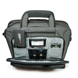 A 16" Graphite Corporate Briefcase w/ three exterior padded pockets, padded handles & shoulder strap showing tech gear inside pockets