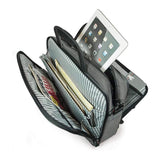 A 16" Graphite Corporate Briefcase w/ three exterior padded pockets, padded handles & shoulder strap showing tech gear, files & tablet inside pockets