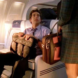 A Pink Suede 16" ScanFast Element Checkpoint Friendly Briefcase w/ Trolley strap for use with rolling luggage, Padded Computer Section, Separate Zippered Workstation, File Sections, Padded Shoulder Strap, Steel Fittings & Faux Leather Wrapped Handles, Exterior Pockets & Matching Detachable Cosmetic Purse being featured on the TV show, "Chuck".