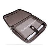An opened black 16"-17" ScanFast Onyx Checkpoint Friendly laptop Briefcase w/ faux-croc trim.
