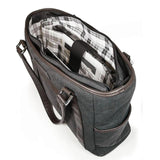 An open charcoal 15.6" Urban Laptop Tote w/ brown leather trim, handles, & padded computer compartment.