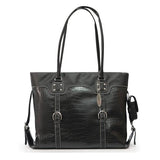 A black 16"-17" Signature Faux-Croc laptop Tote w/ SafetyCell Computer Protection Compartment, Flattened non-slip straps, Detachable Cell Phone Pocket Detachable matching cosmetics/accessory pouch Polished silver buckles & self-healing zipper