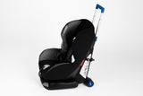 A Mini Travelmate solution attachment for convertible / toddler car seats, wide wheels & telescopic handle w/ baby car seat attached.