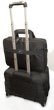 An open black 16" Corporate Laptop Briefcase w/ multiple padded compartments for laptops & travel gear. It's attached to another piece of rolling luggage.
