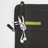 This is a Walter and Ray elephant grey calf skin leather airplane seat back organizer shown w/ earbuds attached.