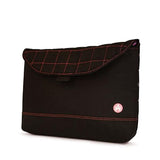 A black quilted 13" laptop sleeve w/ pink stitching, padded corduroy computer compartment, velcro closure & sumo printed liner