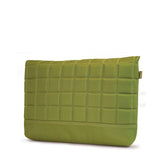 A back view of green 13.3" quilted laptop sleeve w/ padded corduroy computer compartment, velcro closure & sumo printed liner